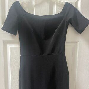 Adorable short black dress w/ruffle bottom by OML - size S